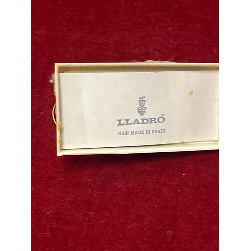 30 - A LLADRO FIGURE OF AN INNOCENT  BABY SLEEPING