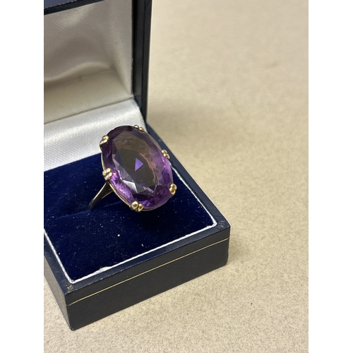116 - A vintage 18ct gold ring set with a large oval amethyst. Stone size 21mm x 15mm. Ring size N, weight... 
