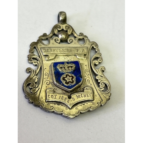 135 - Derby County football interest.  A rare and very early silver & enamel watch fob for Derbyshire Foot... 