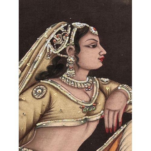 232 - A very large Indian painting on fabric embellished with sequins and depicting a scene from the Rubai... 