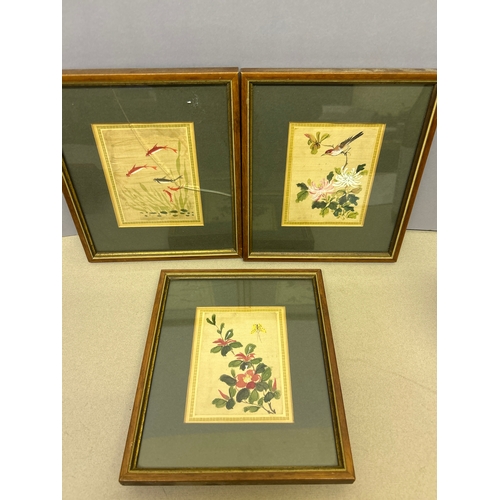 249 - Three early 20th Century Japanese paintings on silk,  depicting flowers, bird and fish. One has crac... 