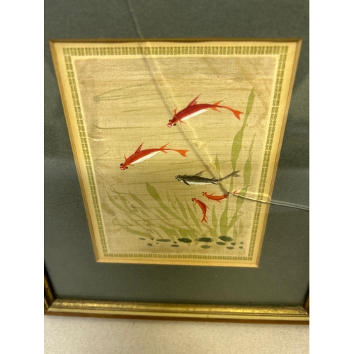 249 - Three early 20th Century Japanese paintings on silk,  depicting flowers, bird and fish. One has crac... 