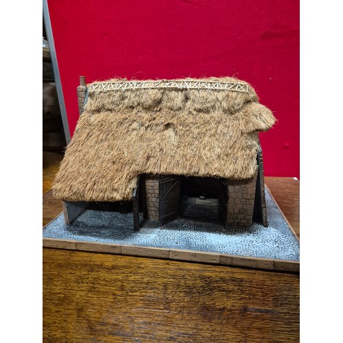 331 - A large and impressive scratch built diorama of a thatched Hop barn or Malt house. The end wall is r... 