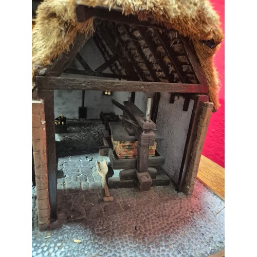 331 - A large and impressive scratch built diorama of a thatched Hop barn or Malt house. The end wall is r... 