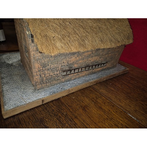 331 - A large and impressive scratch built diorama of a thatched Hop barn or Malt house. The end wall is r... 