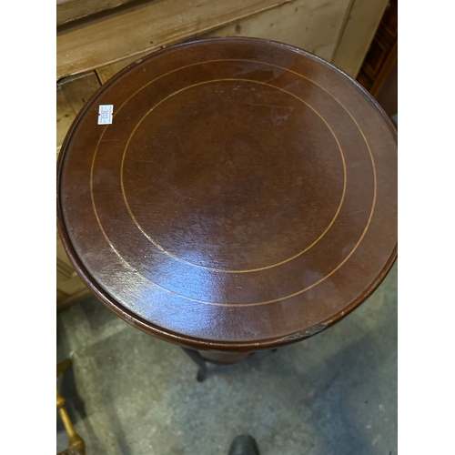 594 - An Edwardian style mahogany plant stand with boxwood stringing to the top, the four square legs join... 