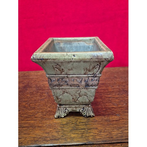 365 - A vintage ceramic garden planter or urn, with a distressed, crackle-glaze finish in a pale green col... 