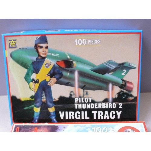 499 - Thunderbirds and Captain Scarlet vintage jigsaws in boxes. Three 100 piece jigsaws made by King, inc... 