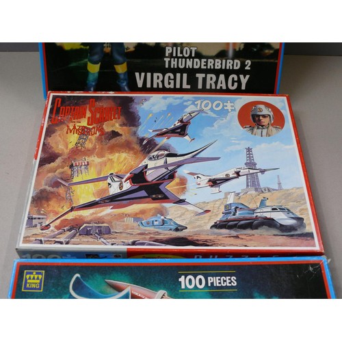 499 - Thunderbirds and Captain Scarlet vintage jigsaws in boxes. Three 100 piece jigsaws made by King, inc... 
