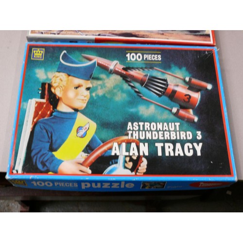 499 - Thunderbirds and Captain Scarlet vintage jigsaws in boxes. Three 100 piece jigsaws made by King, inc... 