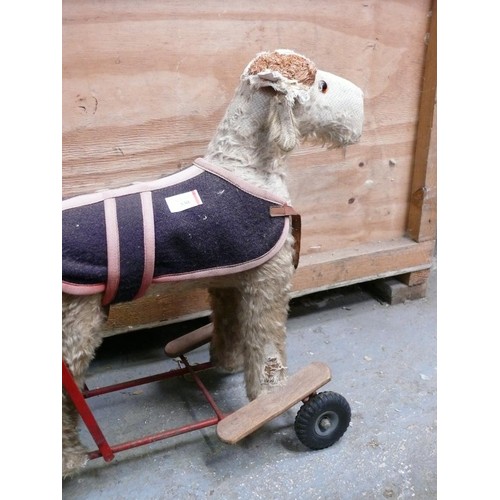 530 - Tri-ang Lines Bros. push-along Mohair dog walker toy.