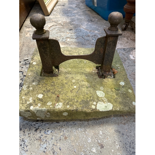675 - A mid Victorian cast iron boot scraper on a stone base. Matches those in the local village of Thorne... 
