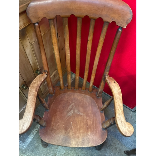 668 - A Victorian grandfather kitchen chair with elm seat, nicely shaped back rail & arms