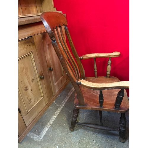 668 - A Victorian grandfather kitchen chair with elm seat, nicely shaped back rail & arms