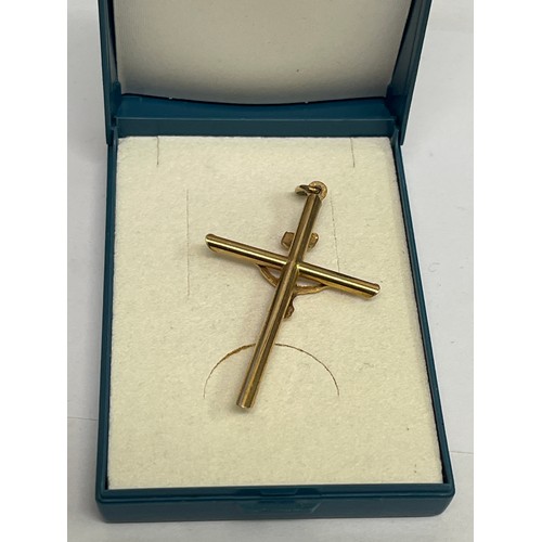 67C - A 9CT GOLD CROSS WEIGHT 2.26GR