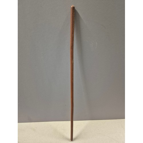 550 - Four vintage/antique Army officers swagger sticks, made of bamboo cane with stitched leather covers.