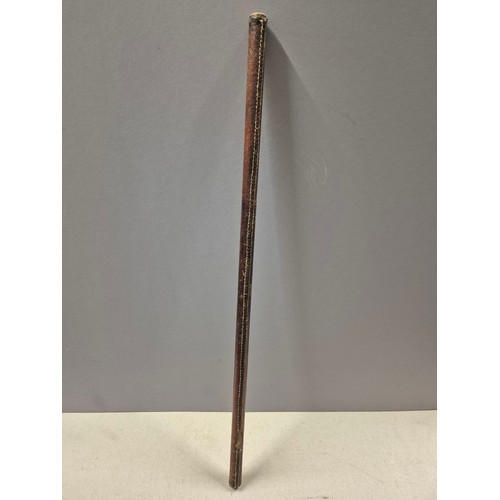 550 - Four vintage/antique Army officers swagger sticks, made of bamboo cane with stitched leather covers.