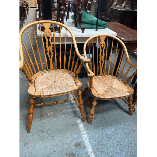 648 - Pair of Victorian Blonde Ash Windsor chairs, with hooped stick backs, central fret cut splats and ru... 