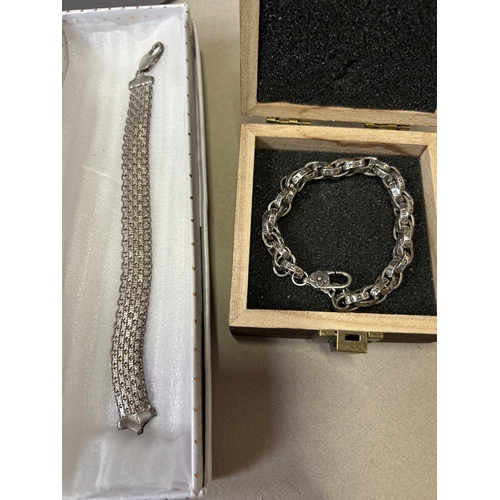 95A - Two sterling silver bracelets, one a fine sterling silver gate bracelet with decorative multi links ... 