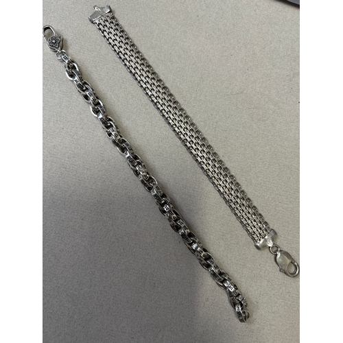 95A - Two sterling silver bracelets, one a fine sterling silver gate bracelet with decorative multi links ... 