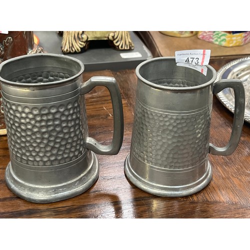473 - Pair of vintage hammered pewter pint tankards.