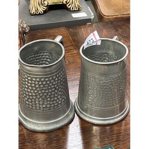 473 - Pair of vintage hammered pewter pint tankards.