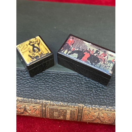 112 - Pair of vintage miniature black bakelite pill boxes. One rectangular (5cm x 2.5cm x 2cm) decorated o... 