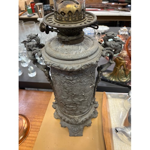 460 - Victorian Zimmermann & Co. Duplex oil lamp, with an unusual cast spelter body decorated with deep re... 