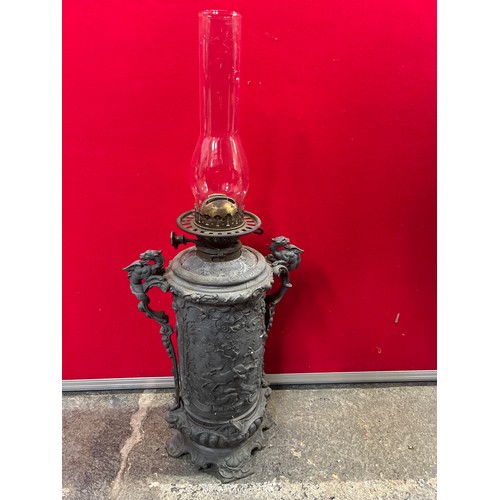 460 - Victorian Zimmermann & Co. Duplex oil lamp, with an unusual cast spelter body decorated with deep re... 