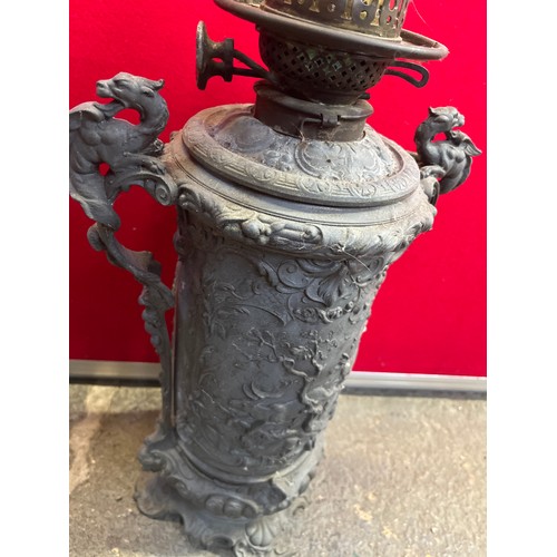 460 - Victorian Zimmermann & Co. Duplex oil lamp, with an unusual cast spelter body decorated with deep re... 