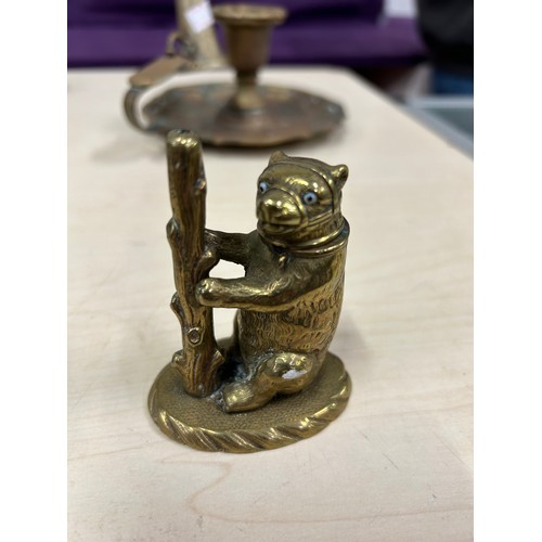 121 - The bear with the ragged staff vesta and a Victorian chamber stick with snuffer