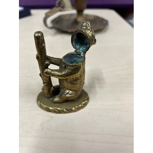 121 - The bear with the ragged staff vesta and a Victorian chamber stick with snuffer