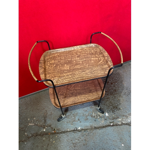 619C - Retro Formica hostess trolley, with two removable faux wood trays in a tubular metal frame. 74cm tal... 