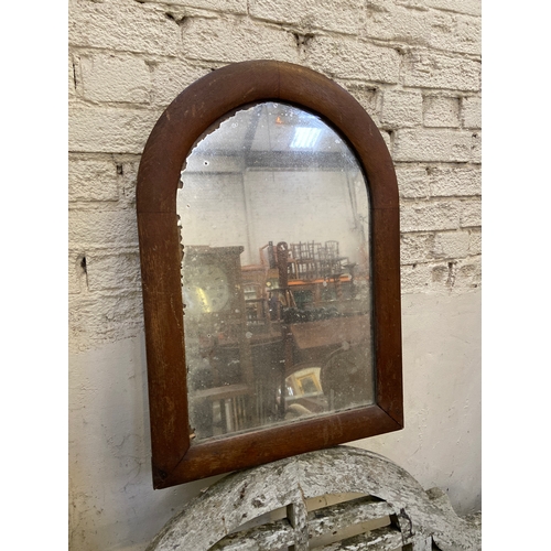231B - Arched wall mirror, with a nicely fixed mirror plate and arch top oak frame. 71cm tall x 50cm wide.