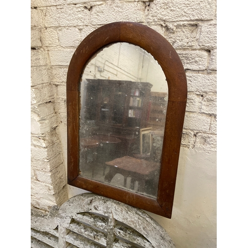 231B - Arched wall mirror, with a nicely fixed mirror plate and arch top oak frame. 71cm tall x 50cm wide.