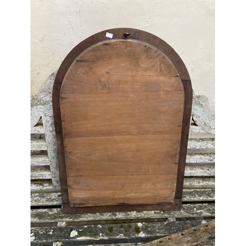 231B - Arched wall mirror, with a nicely fixed mirror plate and arch top oak frame. 71cm tall x 50cm wide.