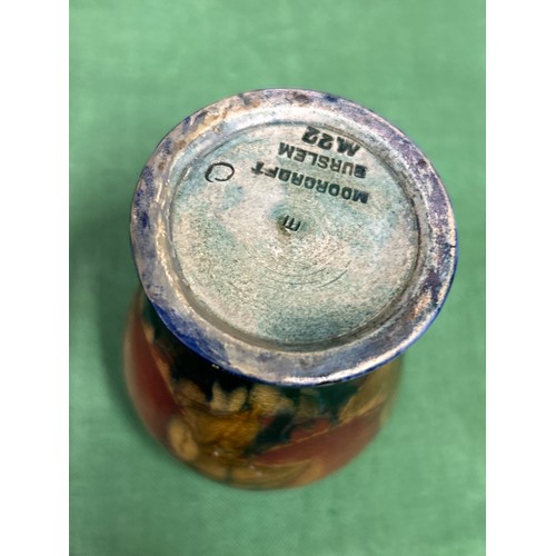 10 - An early 20th Century Moorcroft vase in the Pomegranate pattern with impressed marks “MOORCROFT ENGL... 