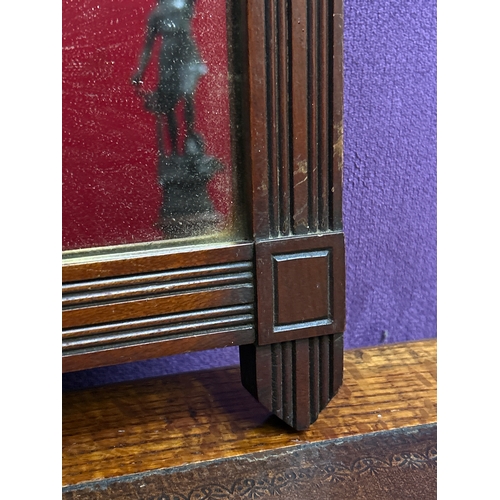 154 - An Edwardian mahogany framed wall mirror with pediment to the top 60cm h