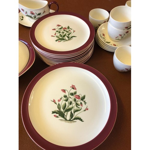 158 - Wedgwood Mayfield Ruby dinner service, 85 pieces, decorated with poppies and a ruby red border. Incl... 