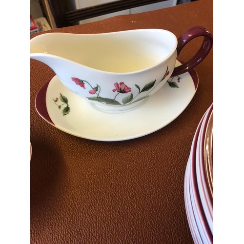 158 - Wedgwood Mayfield Ruby dinner service, 85 pieces, decorated with poppies and a ruby red border. Incl... 