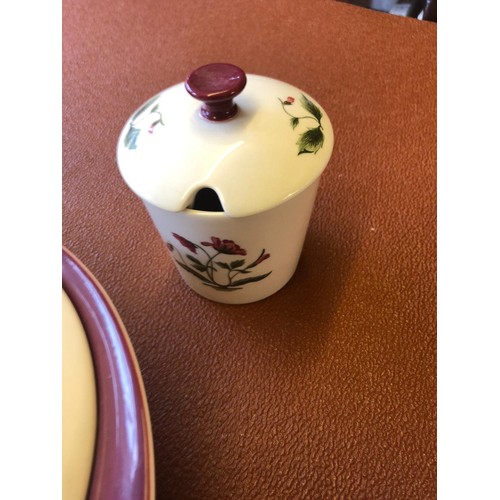 158 - Wedgwood Mayfield Ruby dinner service, 85 pieces, decorated with poppies and a ruby red border. Incl... 