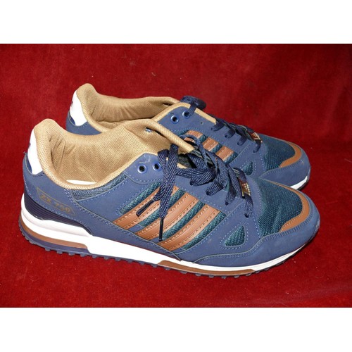 157A - Pair of navy and tan adidas trainers size 46