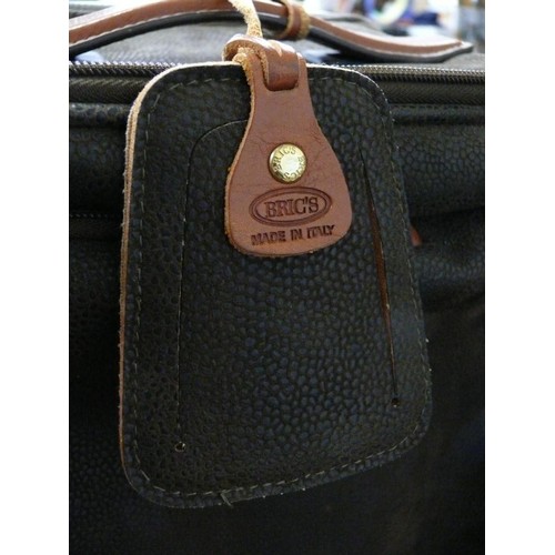 181 - Bric's Cabin Duffle Bag in Olive Green with Tan leather trim, appears in good order