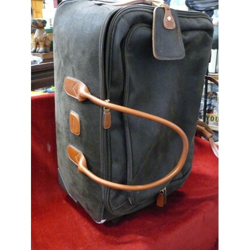 181 - Bric's Cabin Duffle Bag in Olive Green with Tan leather trim, appears in good order
