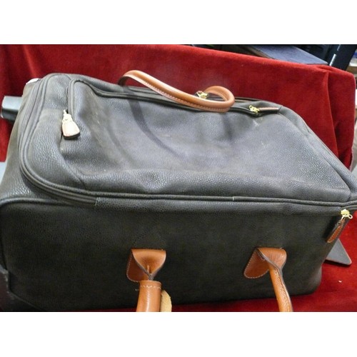 181 - Bric's Cabin Duffle Bag in Olive Green with Tan leather trim, appears in good order