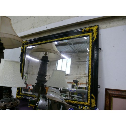 140 - Black and Gold Baroque style mirror with a bevel edge