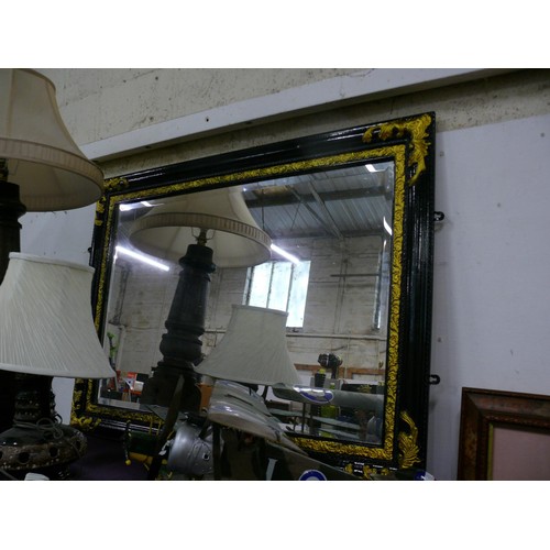 140 - Black and Gold Baroque style mirror with a bevel edge