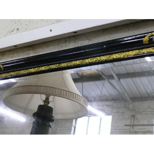 140 - Black and Gold Baroque style mirror with a bevel edge