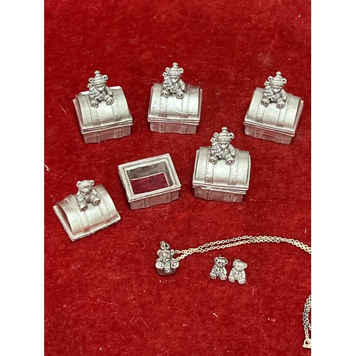 8 - SEVERAL LITTLE TREASURE CHESTS WITH TEDDY BEARS SITTING ON TOP AND TEDDY BEAR NECKLACES INSIDE