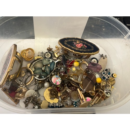 16 - a tub of brooches,  badges and earrings